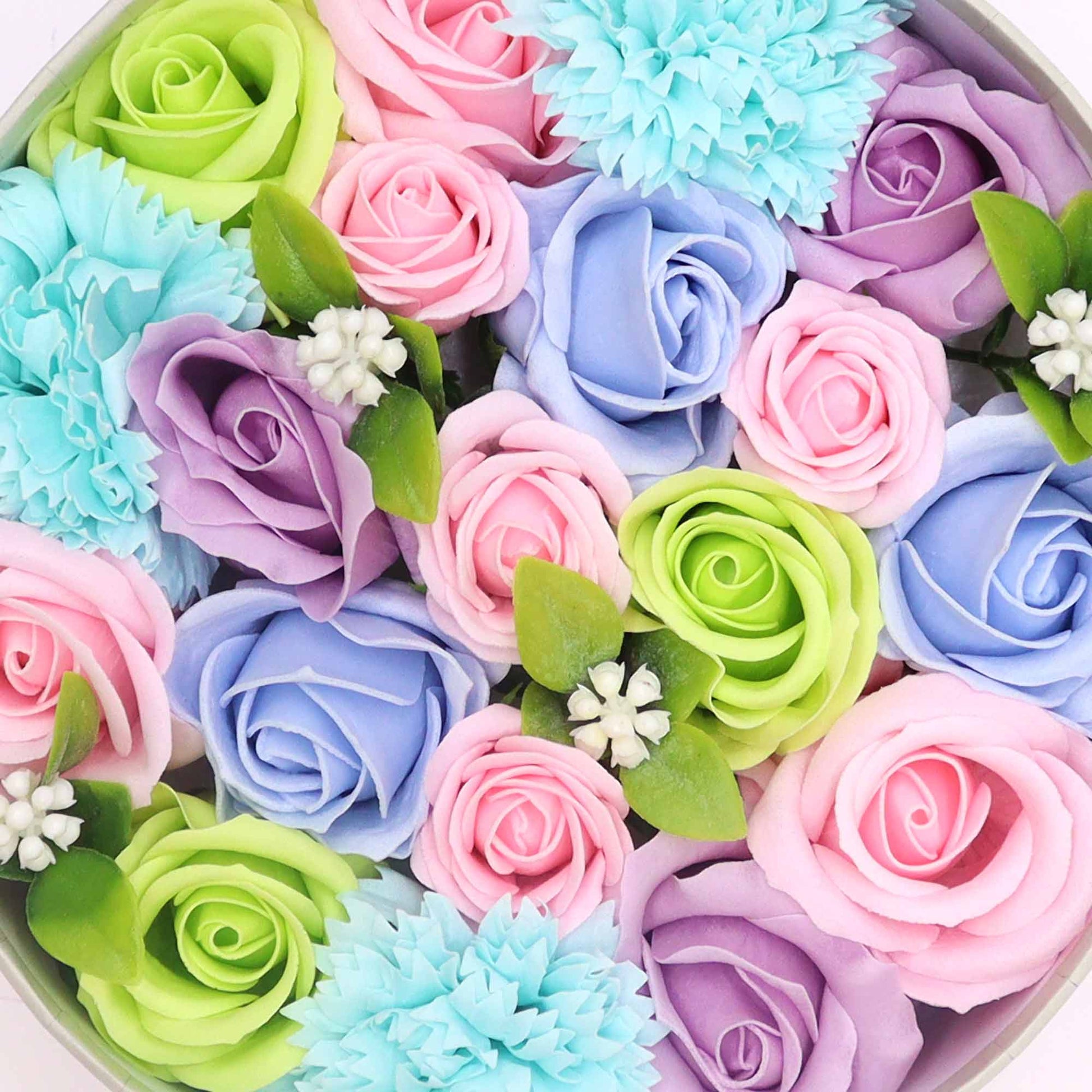 Celebrate the joy of new life and blessings with a Soap Flower Gift Round Box in a delightful shade of blues. This charming gift set is not just a treat for the eyes but also a thoughtful way to convey your warm wishes to new parents