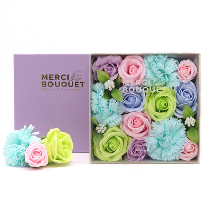 Celebrate the joy of new life and blessings with a Soap Flower Gift Square Box in a delightful shade of blues. This charming gift set is not just a treat for the eyes but also a thoughtful way to convey your warm wishes to new parents