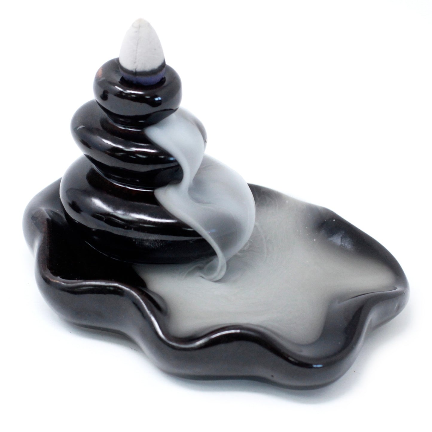 Create smoke that cascades downwards, pouring dramatically down the tower with a stunning effect. Once you have lit your incense cone, it will begin to smoke, the incense is heavier than air and it will fall dramatically in swirls and twists, through the hole and down over the item, to pool at the bottom.&nbsp;

These Backflow Incense Burners are suitable for Home, Office, Teahouse, Meditation, Yoga studio.&nbsp;

Please note: In order to create the smoke cascade effect you will need to use Backflow Incense