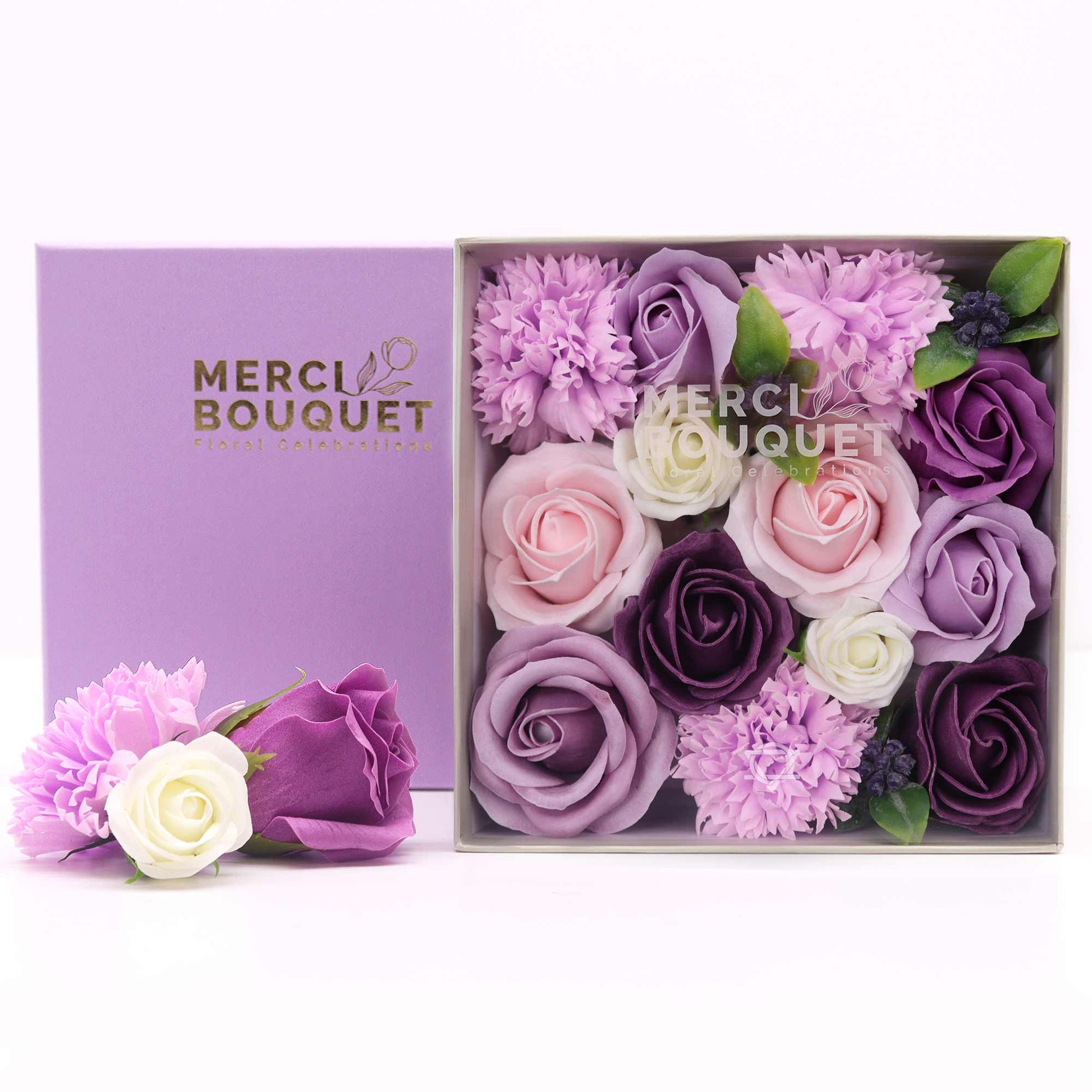 Indulge in the allure of royalty with a Soap Flower Gift Square Box in Lavender Rose &amp; Carnation. This enchanting gift set combines the regal shade of purple with the timeless elegance of roses and carnations.