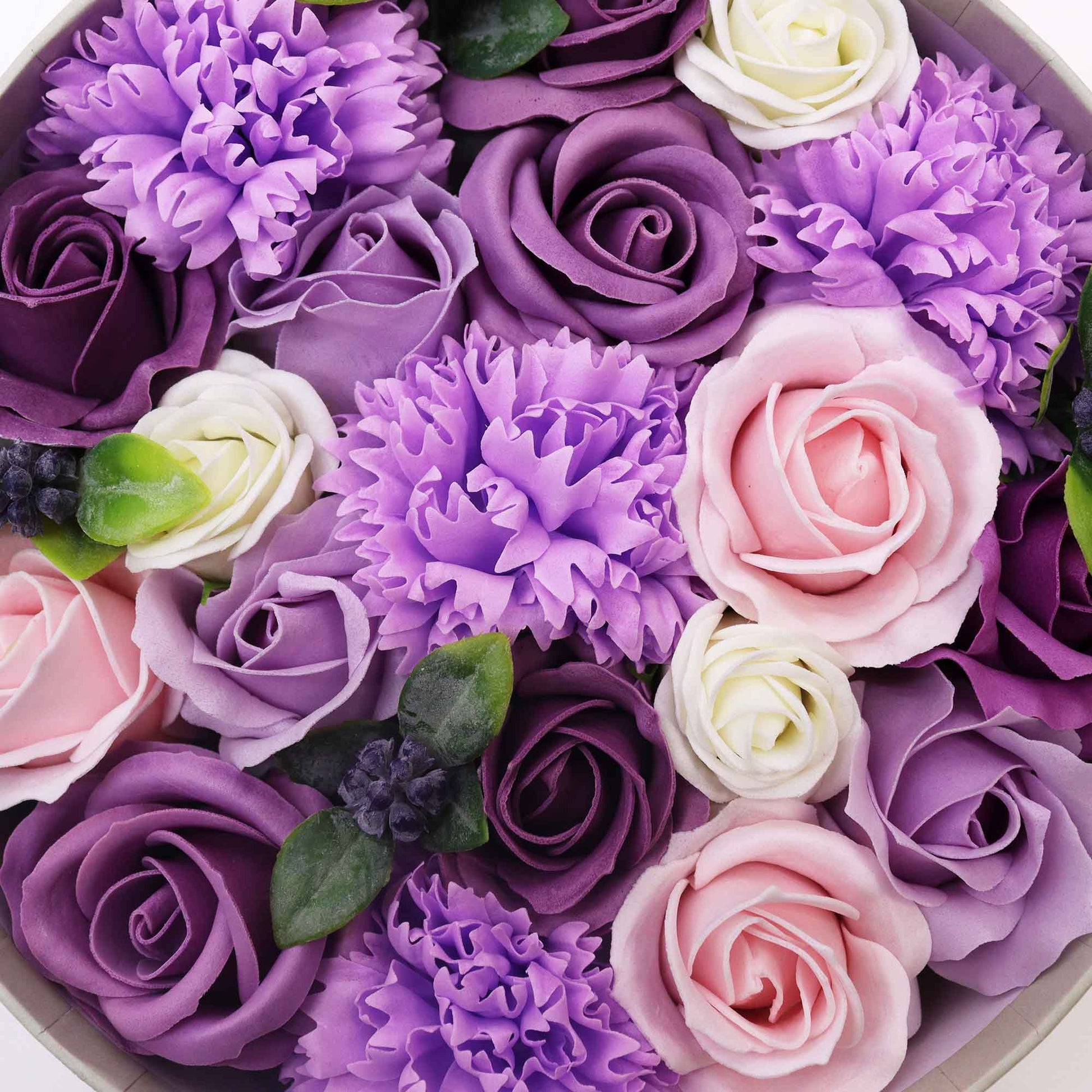 Indulge in the allure of royalty with a Soap Flower Gift Round Box in Lavender Rose &amp; Carnation. This enchanting gift set combines the regal shade of purple with the timeless elegance of roses and carnations.