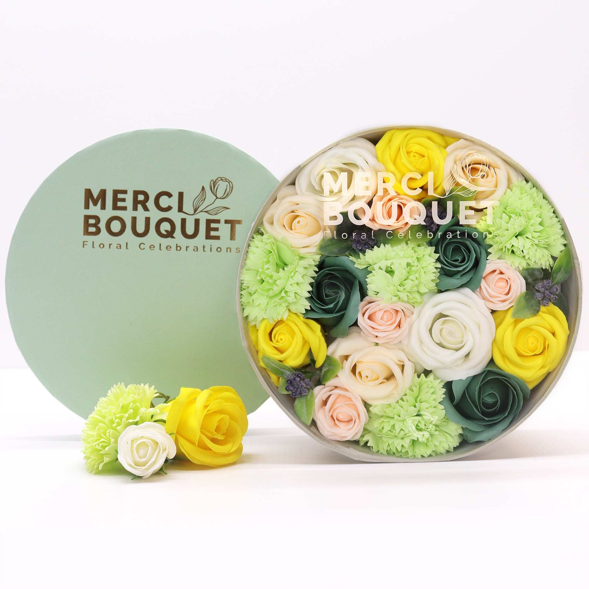 Embrace the beauty of spring all year round with a Soap Flower Gift Round Box in a delightful blend of yellows and greens. This exquisite gift set captures the essence of blooming gardens and the vibrancy of the season.