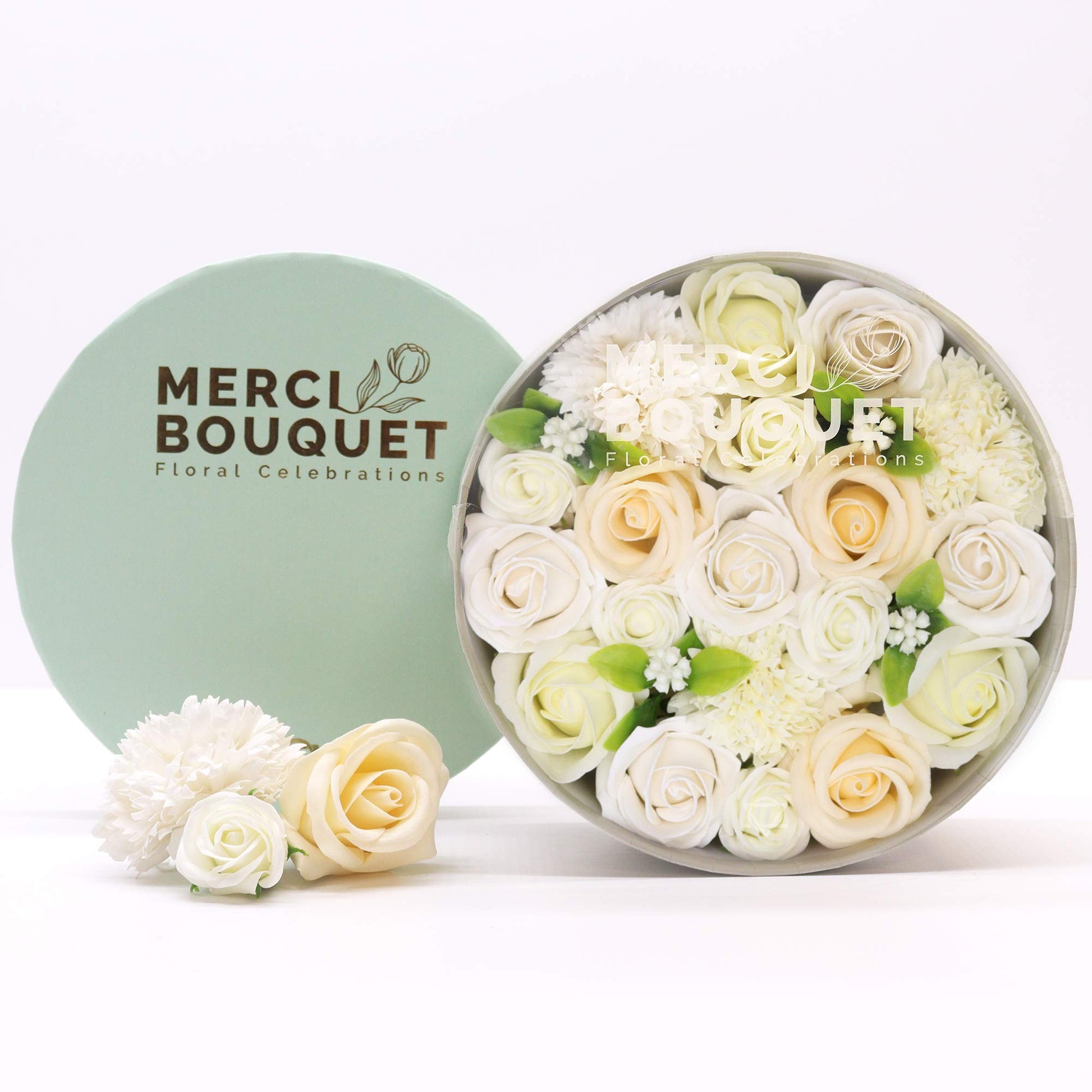 Make your gift-giving an unforgettable experience with Soap Flowers Round Box, in the exquisite "Wedding Blessings - White &amp; Ivory" collection. Crafted with meticulous attention to detail, each soap petal embodies a blend of artistry and quality that sets it apart.