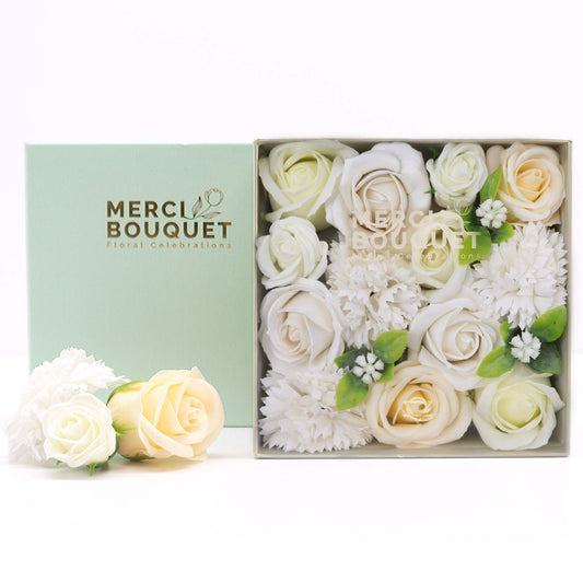 Make your gift-giving an unforgettable experience with Soap Flowers Square Box, in the exquisite "Wedding Blessings - White &amp; Ivory" collection. Crafted with meticulous attention to detail, each soap petal embodies a blend of artistry and quality that sets it apart.