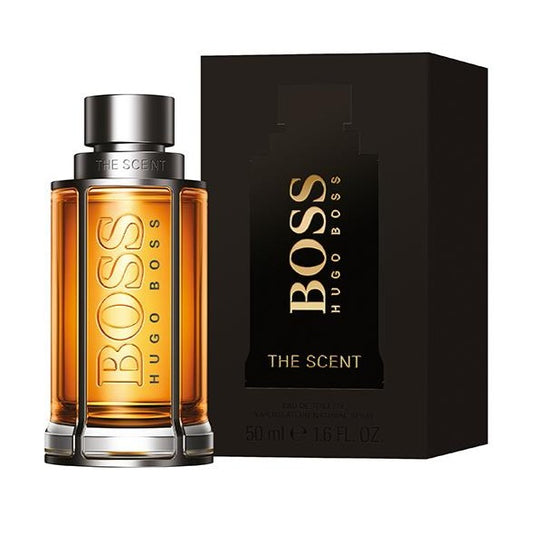 Hugo Boss Boss the Scent Eau de Toilette For Him 50ml Spray An aromatic spicy fragrance for men.  TOP NOTES: Ginger, Mandarin Orange, Bergamot  HEART NOTES: Maninka, Lavender  BASE NOTES: Leather, Woody Notes